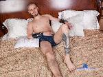 darrell-diamond flirt4free livecam show performer Tattoed handsome guy with big curved dick and sexy feet  is ready to give all his love