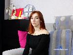 justina-taylor flirt4free livecam show performer A wild and vibrant flower with stunning charm