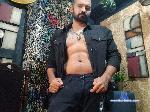 oro-jackson flirt4free livecam show performer latino serious looking and tattooed ready for some fun 